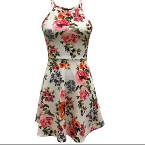 Junior strappy sleeveless floral printed swing dress with a keyhole back